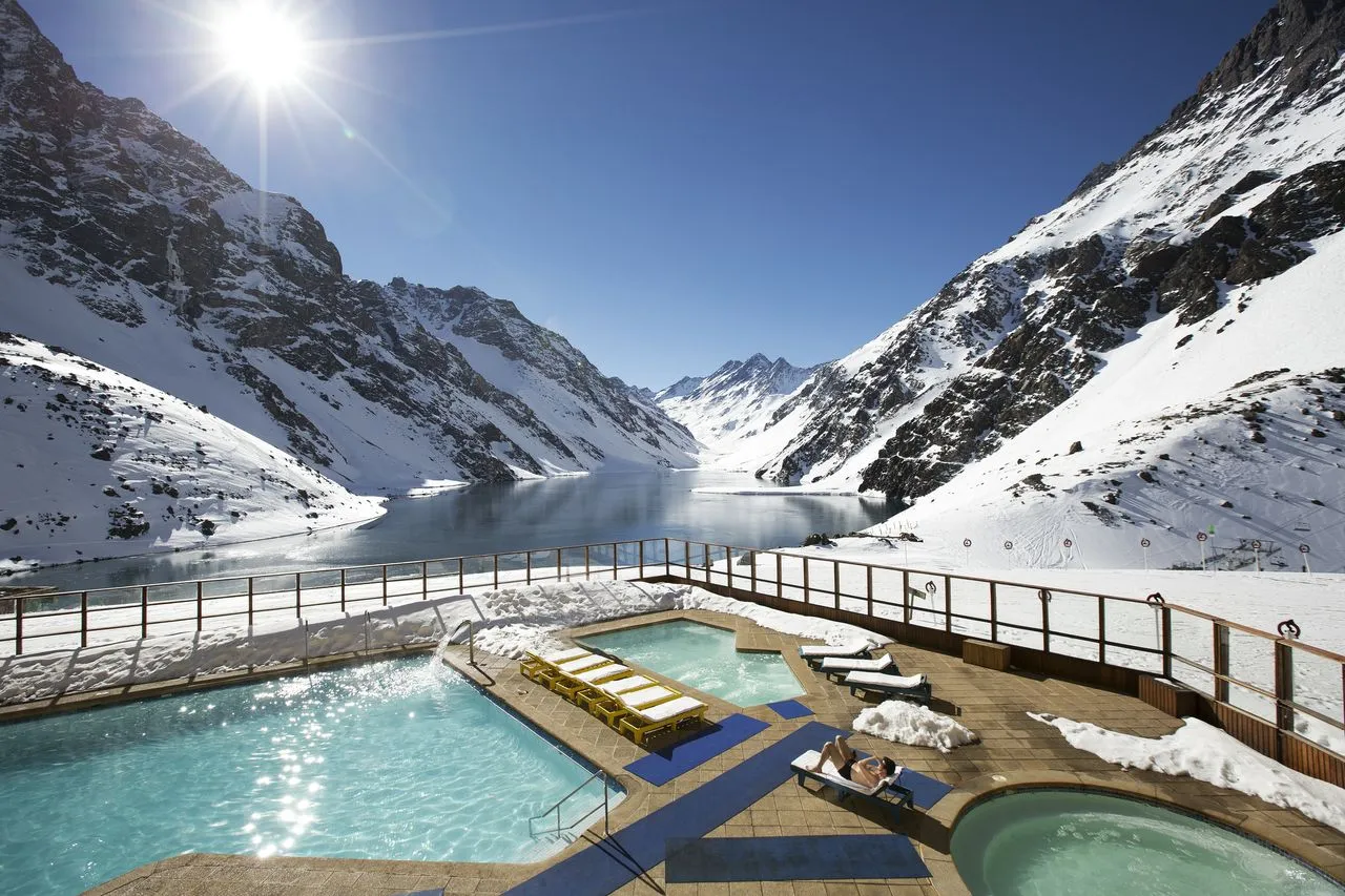 Stunning daytime pool with sun flare