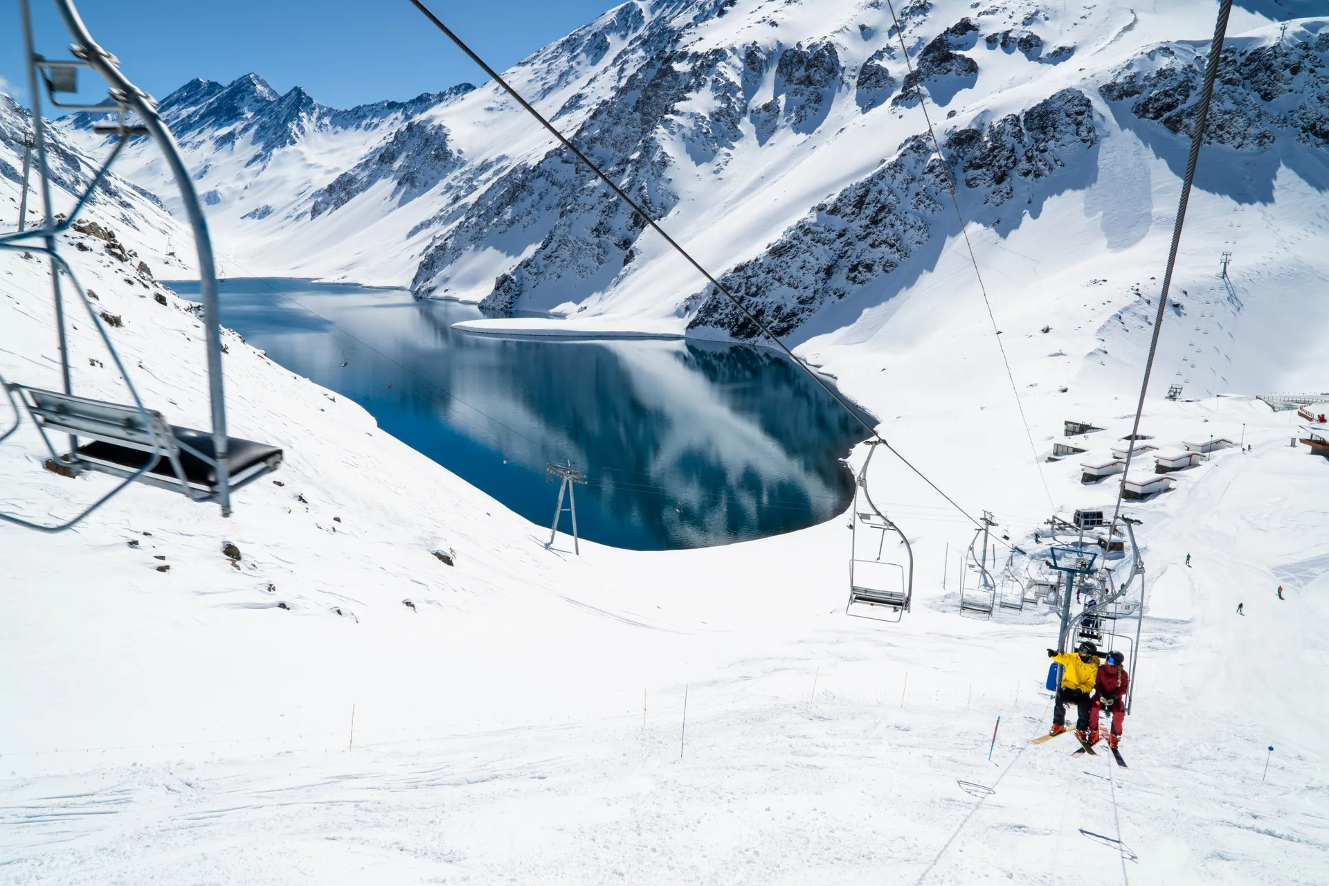 Scenic chairlift ride over frozen lake